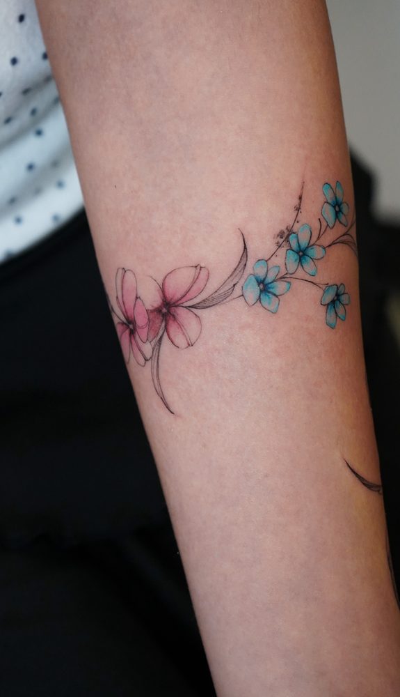 Floral tattoo by Zhu Inks - San Diego