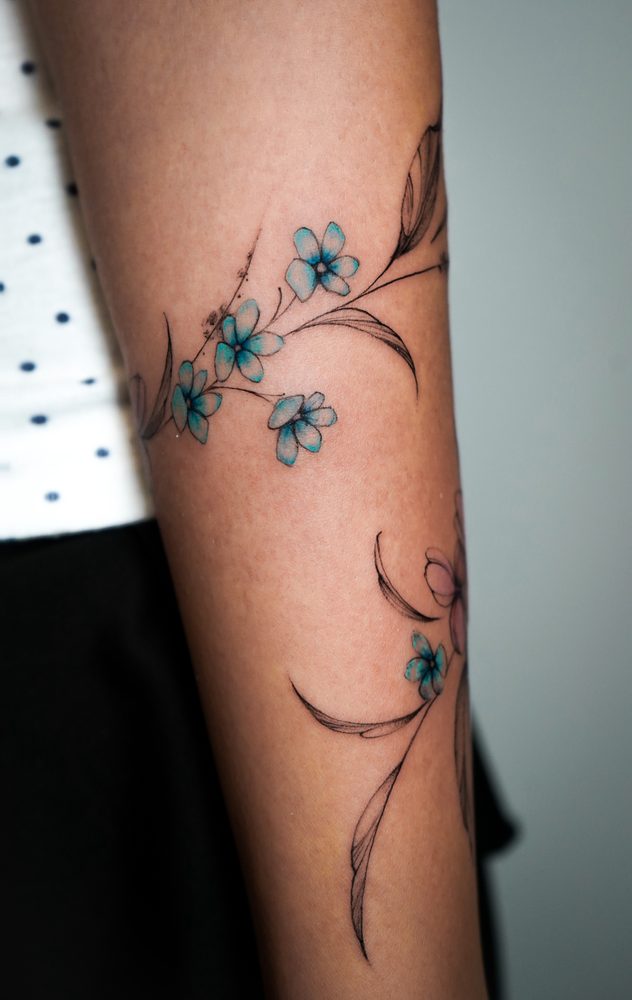 Floral tattoo by Zhu Inks - San Diego