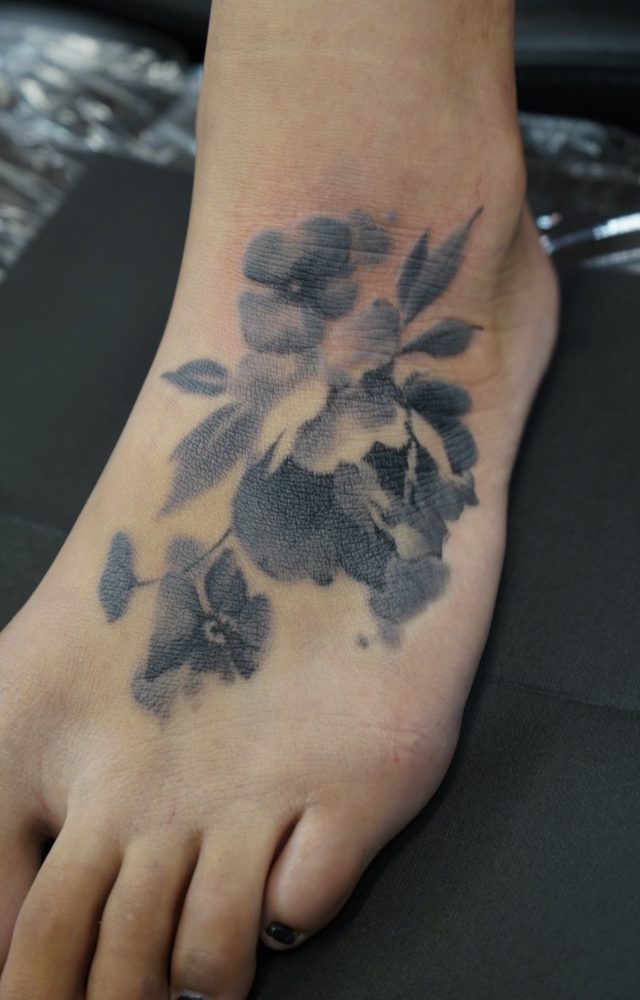 Floral tattoo by Zhu Inks - San Diego