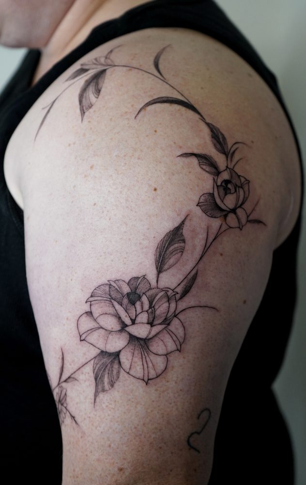 Floral tattoo by Zhu Inks - San Diego