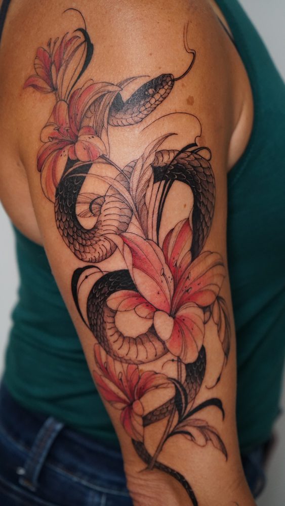 Floral tattoo by Zhu Inks - San Diego